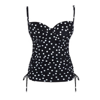 Black tank top with white polka dot pattern on a white background