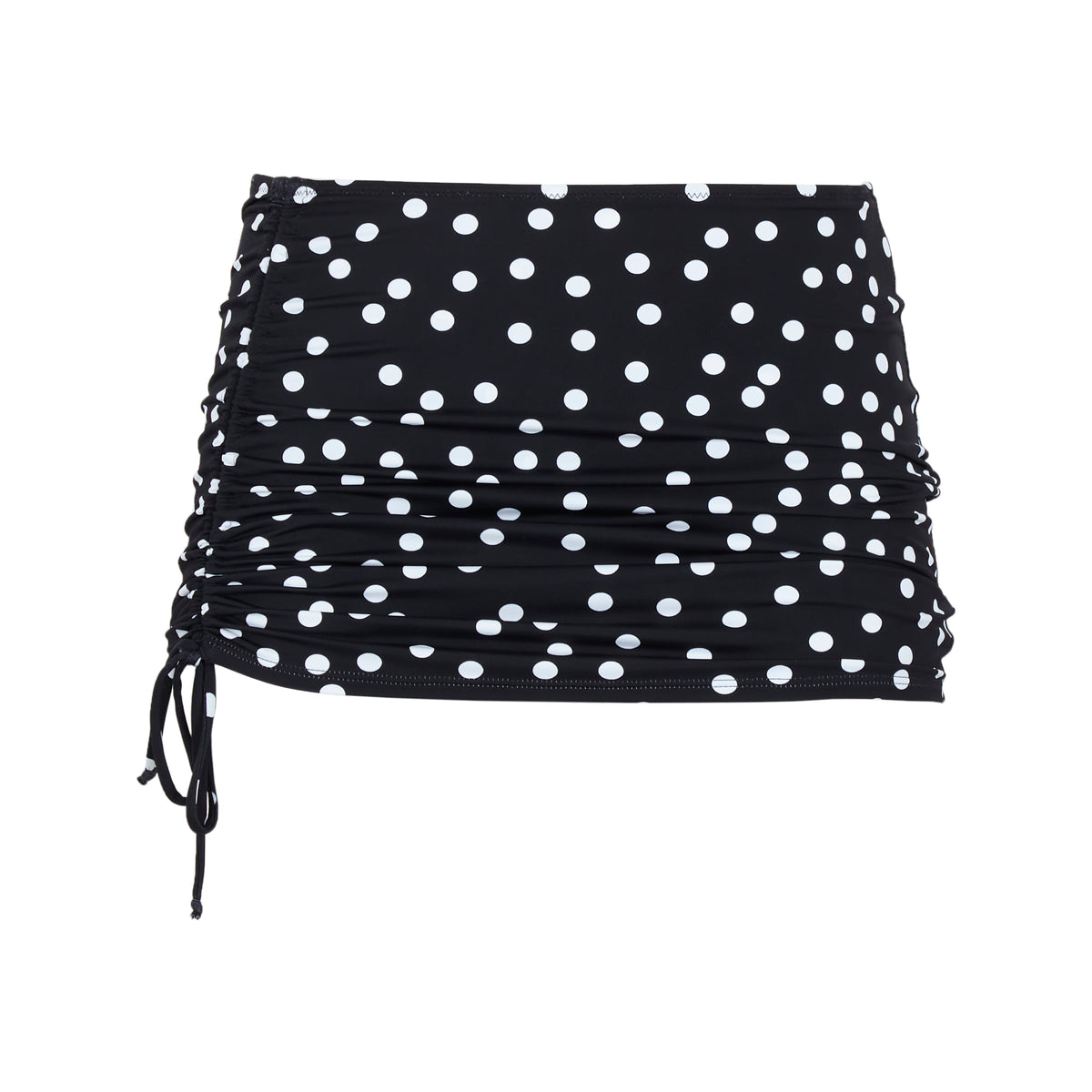 Black skirt with white polka dots on a white background