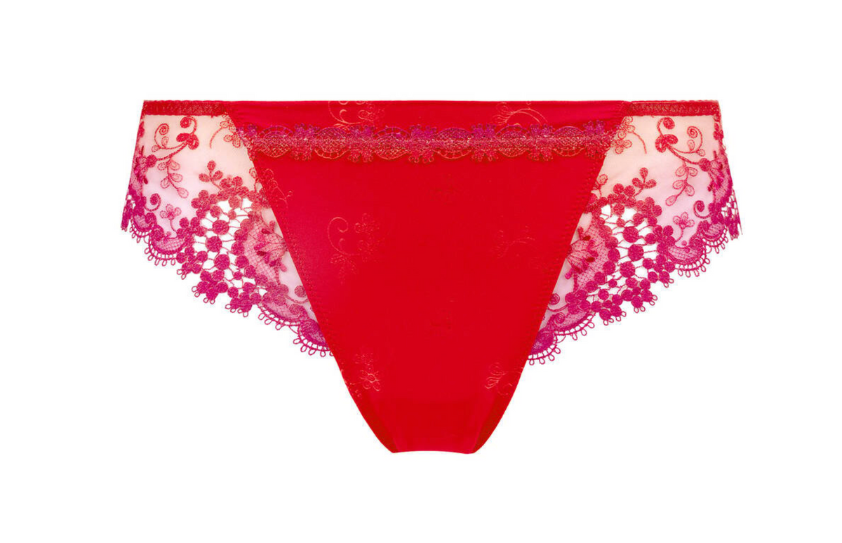 Red women's underwear with floral lace trim on a white background