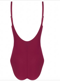 Maroon swimsuit with thin straps on a white background