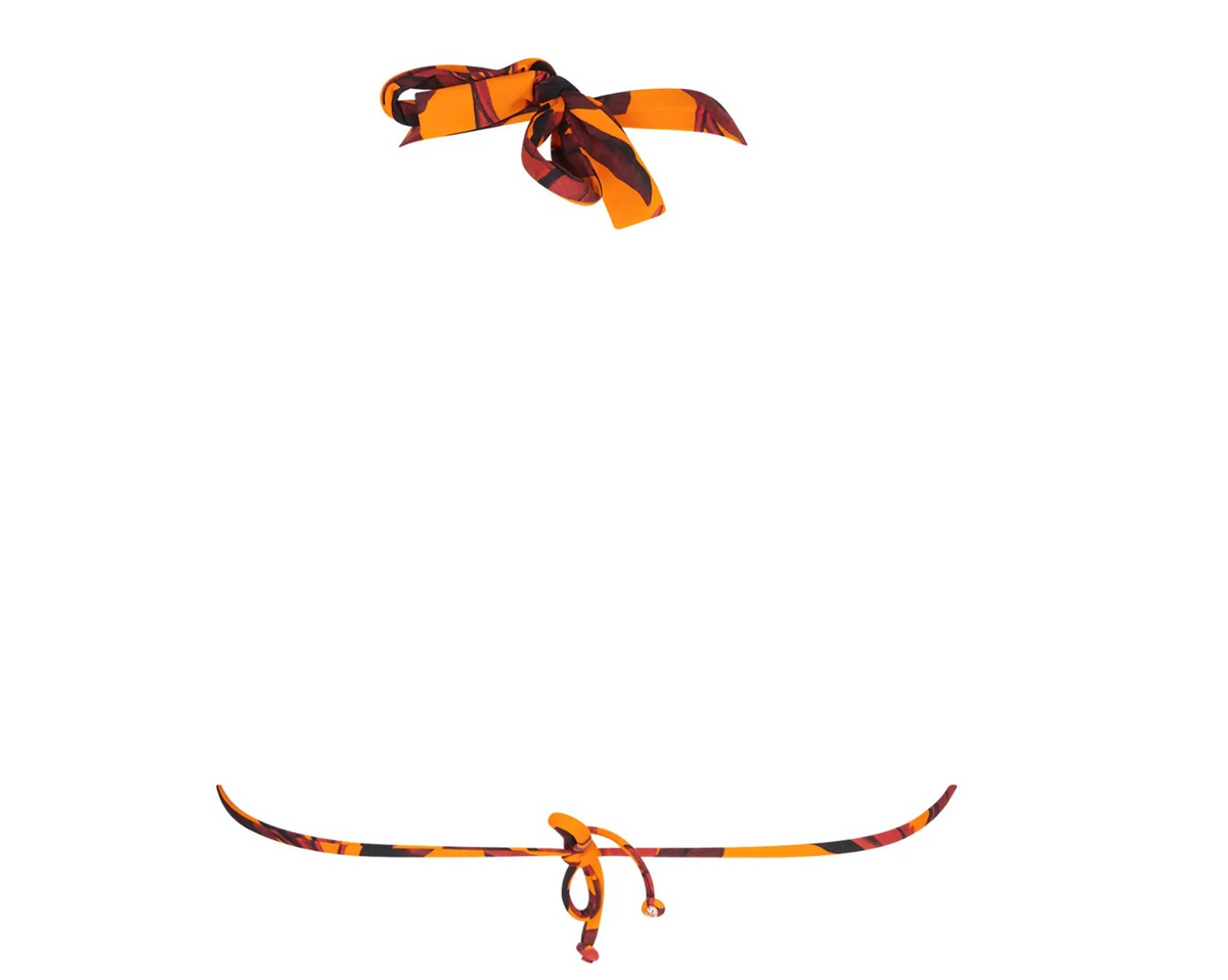 Decorative ribbon with orange and black pattern on a white background
