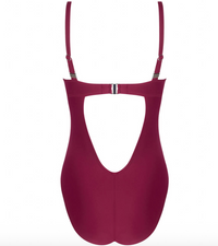 Maroon swimsuit with thin straps on a white background