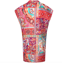 Colorful patterned top on a white background