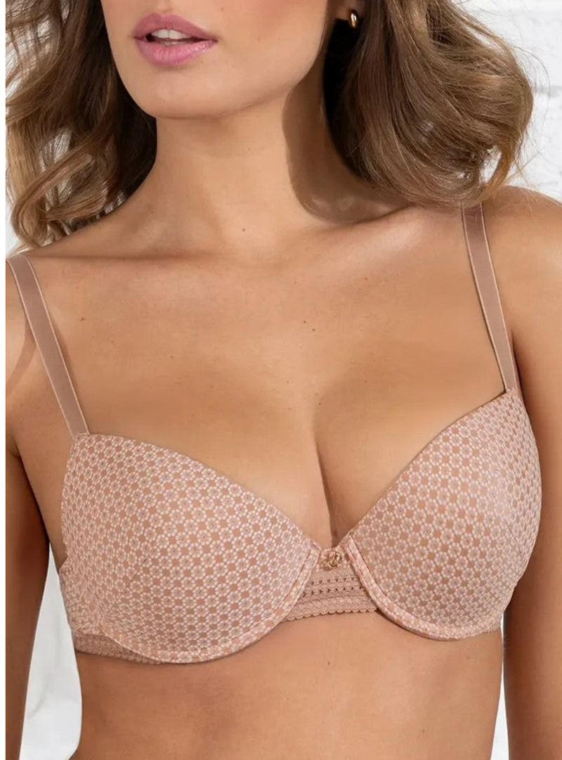 Beige bra worn by a model on a white background
