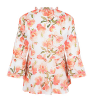 Floral patterned top on a white background