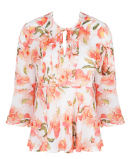 Floral blouse with pink and green flowers on a white background
