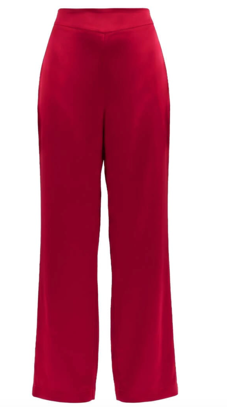 A pair of high-waisted, wide-leg trousers in a rich red silk fabric, shown against a plain white background.