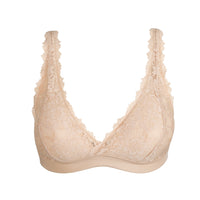 Beige lace bra on a white background