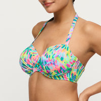 Multicolored bikini top on a model against a neutral background