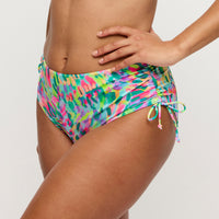 Multicolored bikini bottom with a tie side on a plain background