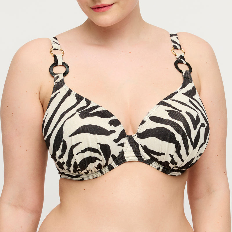 Black and white zebra print bikini top on a plain background
