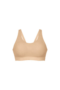 A beige wireless bralette with wide shoulder straps and a scoop neckline, shown against a plain white background.